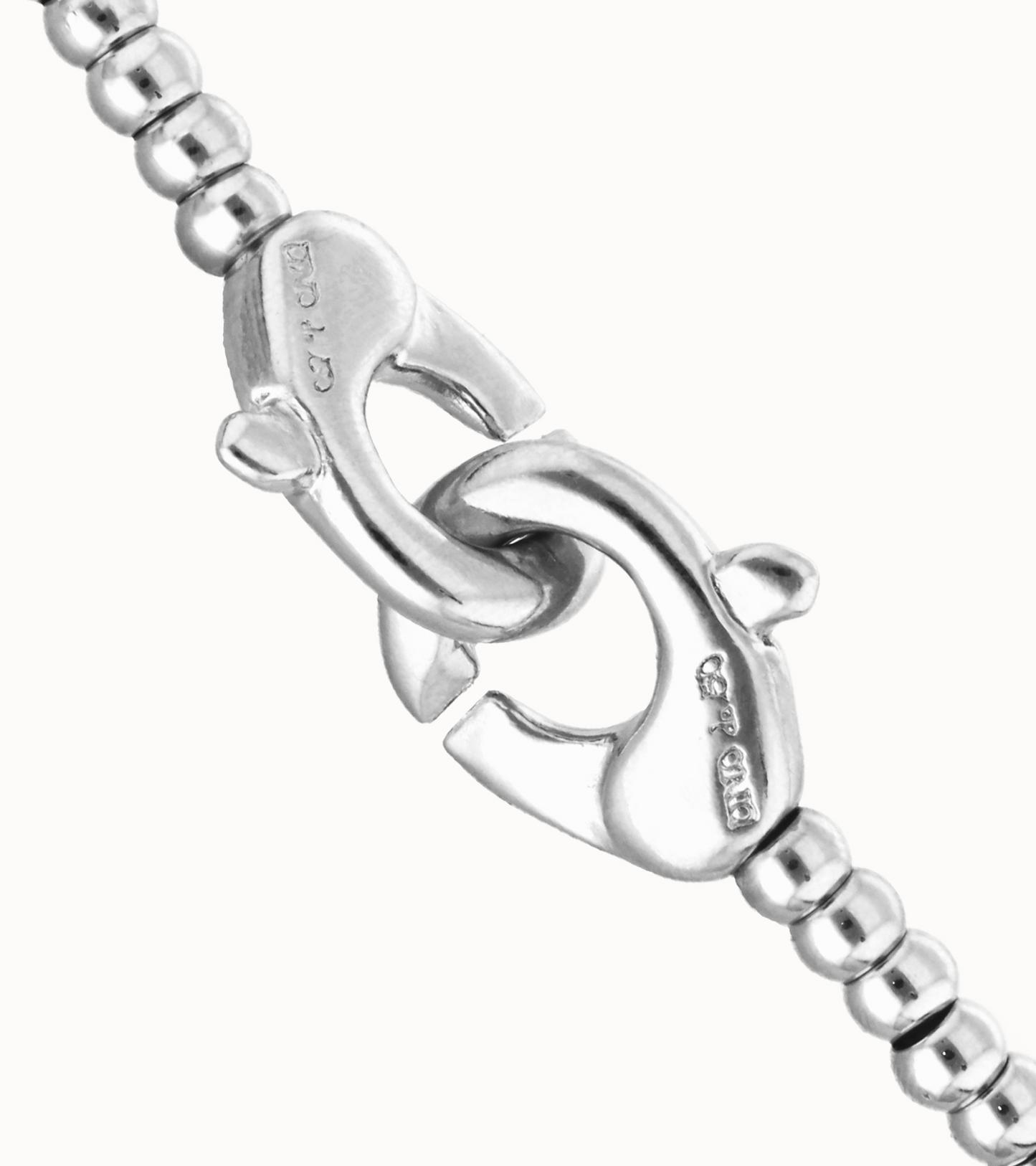 Small beads bracelet with interlocking carabiner