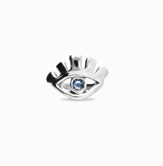 Eye-shaped ring with faceted blue crystal