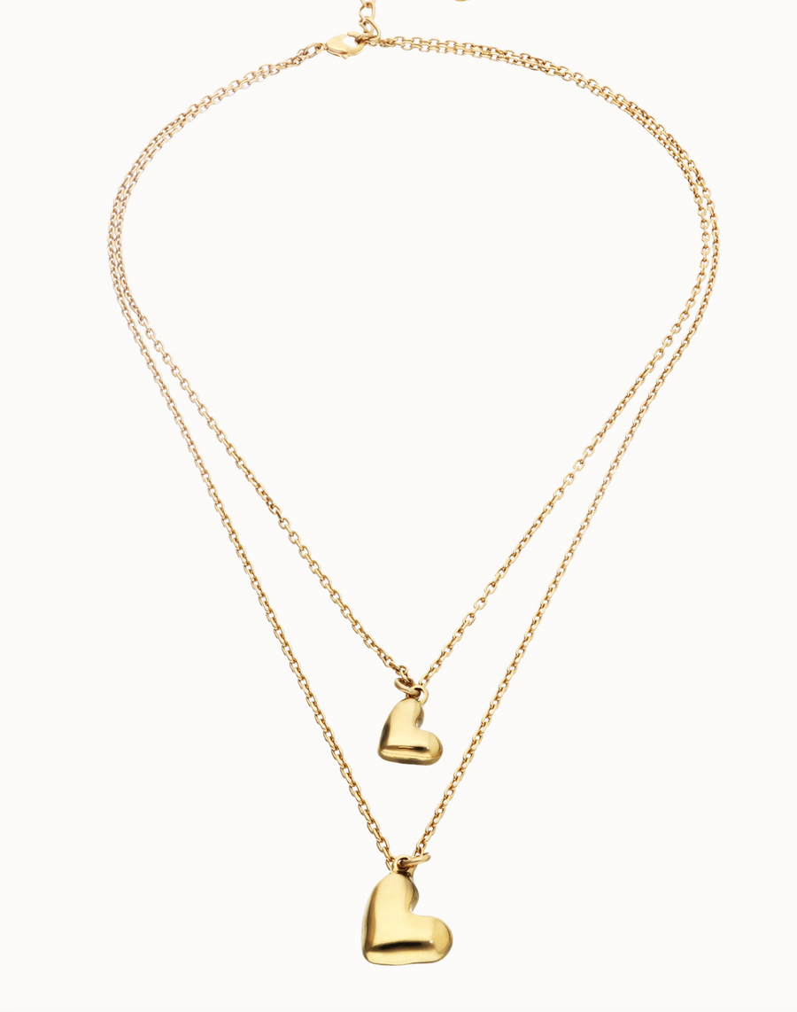 Multi strand chain necklace with two hearts