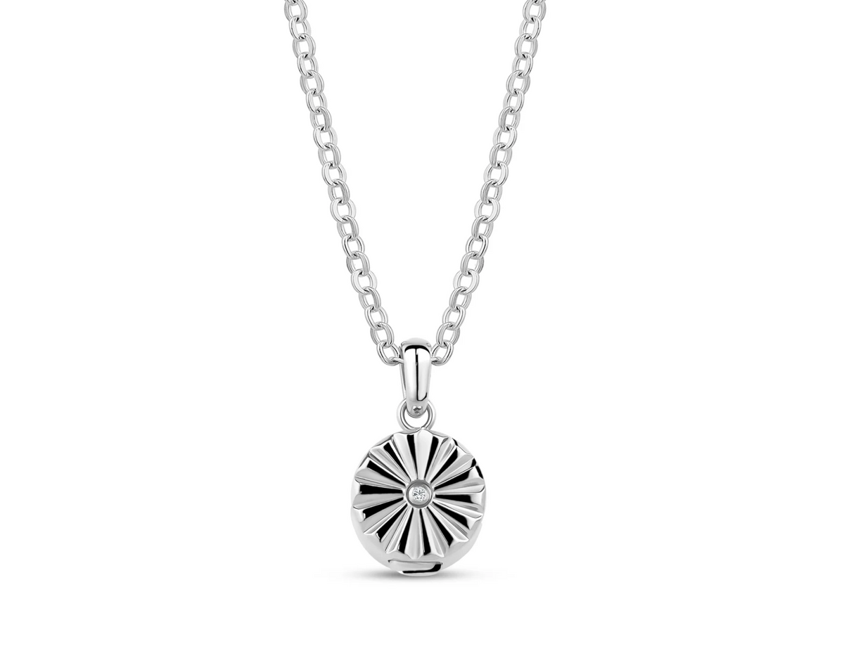 SUN-INSPIRED PENDANT FOR ASHES