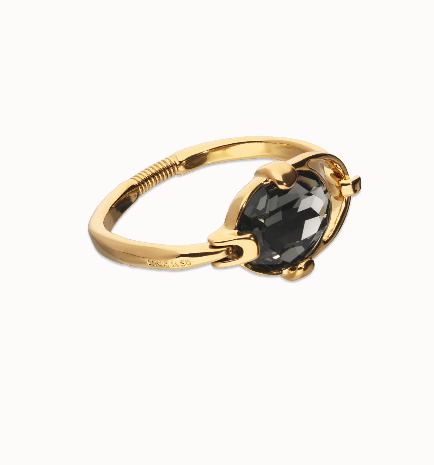 Pulsera rígida bañada en plata de ley con cristal facetado ovalado gris