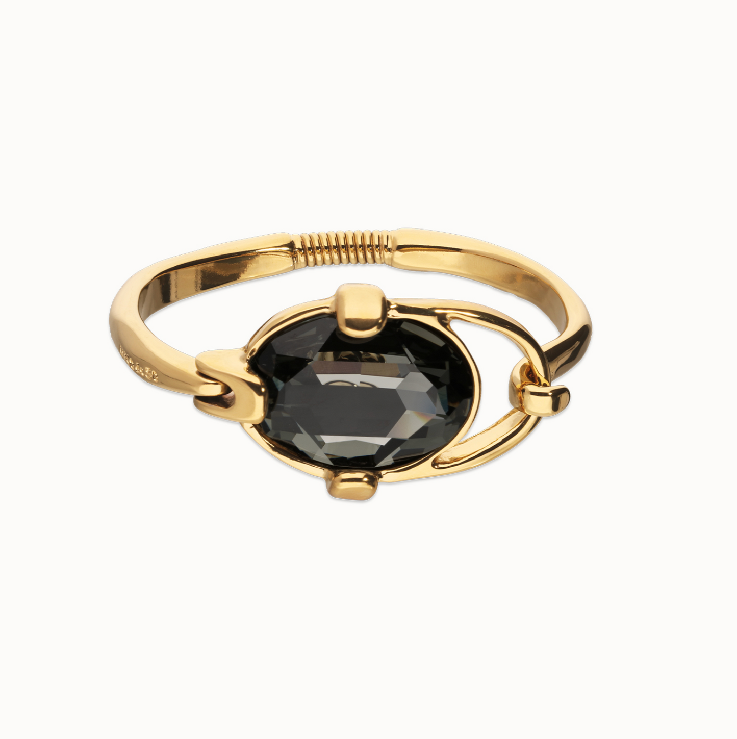 Pulsera rígida bañada en plata de ley con cristal facetado ovalado gris