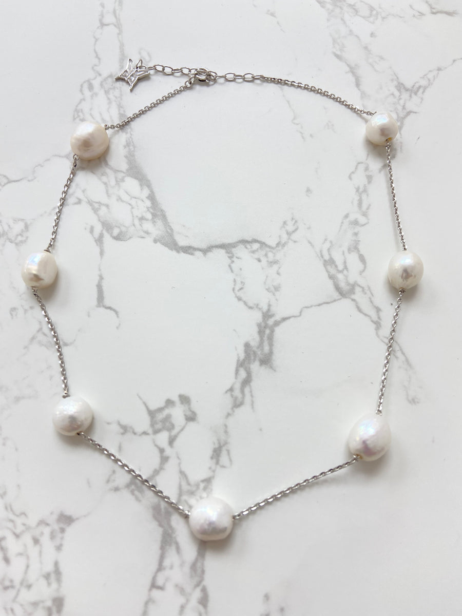 Collar Mariposa en Plata con Siete Perlas Naturales