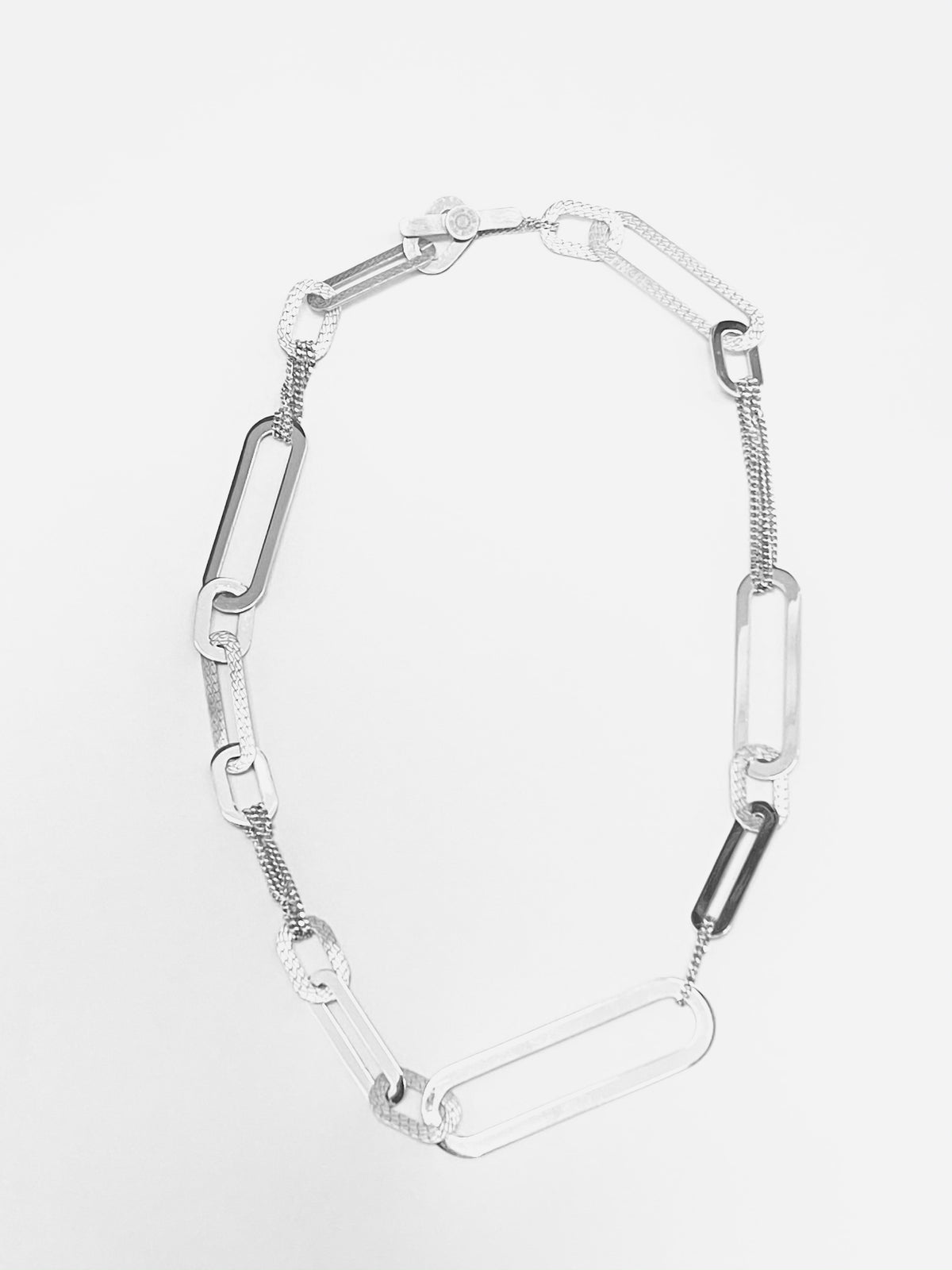 Embrace Necklace | PNG68 Designed by Franco Pianegonda | Luby 